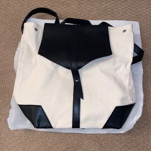 brand new, never opened, canvas backpack